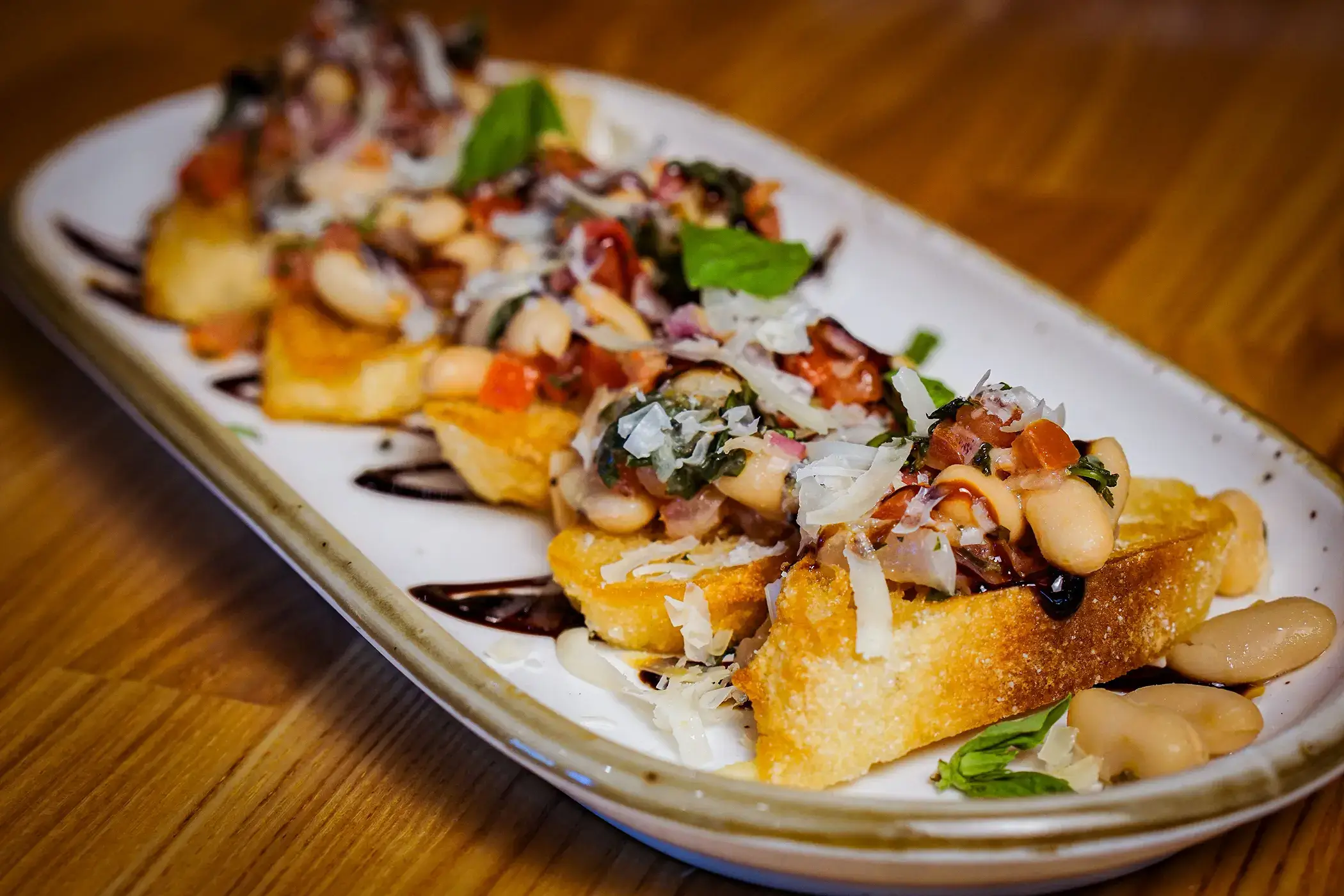 rule prime pasta closeup of gourmet dish with bread toppings warm lighting rich textures appetizing ingredients hickory