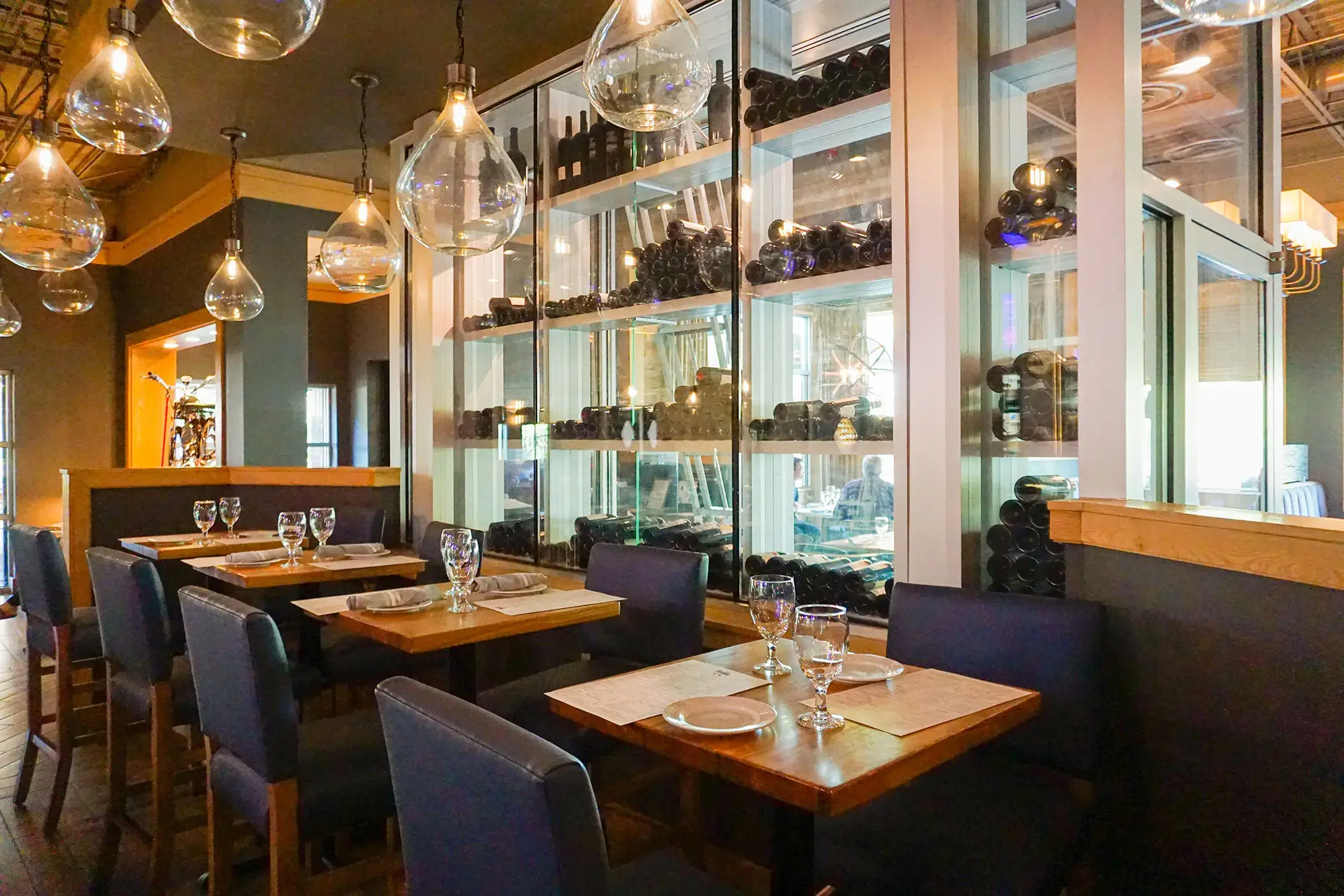 rule prime pasta elegant modern interior with pendant lights wood glass elements upscale restaurant design hickory nc